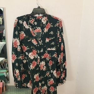 Torrid floral size 3 button down much longer in back blouse.